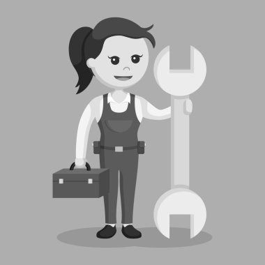 büyük İngiliz anahtarı ve araç kutusu siyah beyaz stili ile kadın makinist