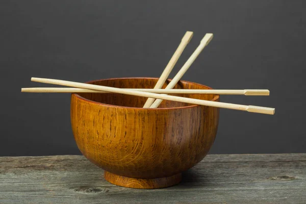 Eetstokjes en bowl Stockafbeelding