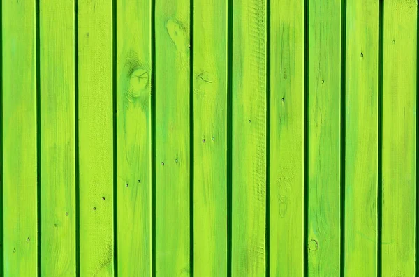 wooden fence painted in green color