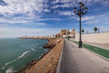 Promenade of Cadiz with a view to Catedral de Cadiz clipart