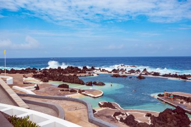 PORTO MONIZ, MADEIRA ISLAND, PORTUGAL - OKTOBER, 2014: Porto Moniz Natural Swimming Pools on Madeira. Madeira Island, Portugal