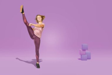 aerobik ve fitness egzersiz dans tarafından spor elbiseli bir genç kız