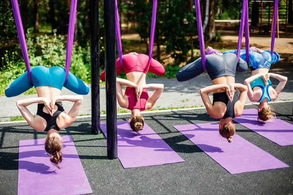 Exercise in the open air. Aerial yoga. — Stock Photo, Image