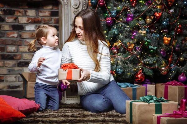 Happy family with christmas gifts — Stock Photo, Image