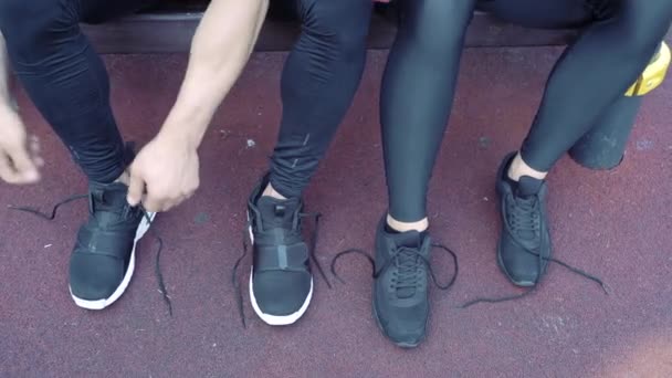 Close Hands Man Woman Tying Shoelaces Sneakers Training Outdoors — Stock Video