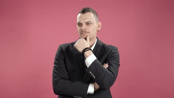 Thoughtful Business Man Studio Pink Background — Stock Video