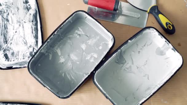 Two Shades Grey Decorative Plaster Paint Spatulas Cardboard — ストック動画