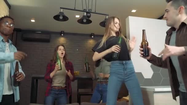 Group Happy Multi Ethnic Friends Clinking Glasses Beer Dancing Home — Stock Video