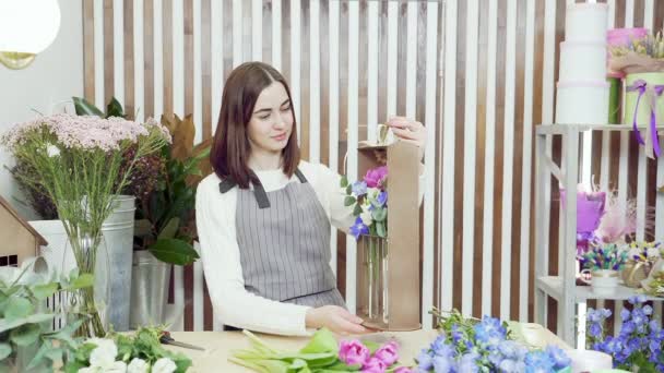 Slow Motion Portrait Female Florist Holding Flower Arrangement Looking Camera — Stock Video