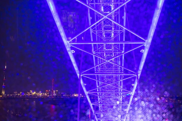 Rain wallpaper - view of Dusseldorf from the Ferris wheel in the rain. Romantic beautiful purple wallpaper