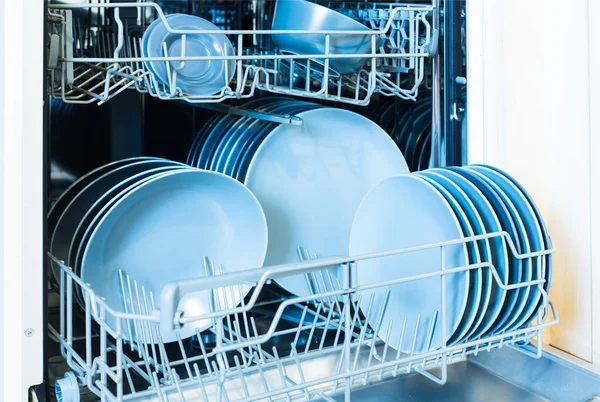 Open dishwasher with clean dishes after cleaning process — Stock Photo, Image