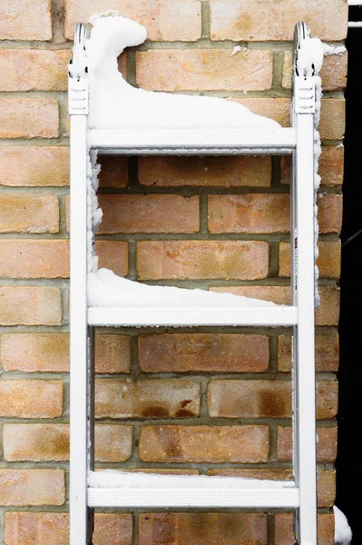 Snow on a ladder — Stock Photo, Image