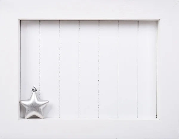 White wooden frame and  christmas decoration over white background — Stock Photo, Image