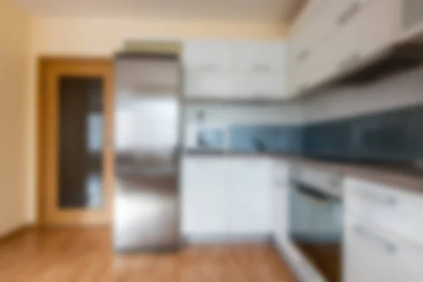 Abstract blur modern white kitchen interior for background