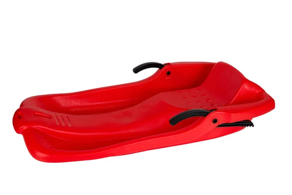 Plastic red sled for skiing on white background — Stock Photo, Image