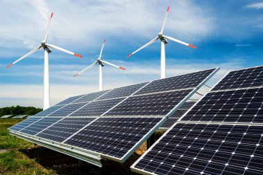Fotoğraf kolaj güneş panelleri ve Rüzgar turbins - sürdürülebilir kaynaklar kavramı