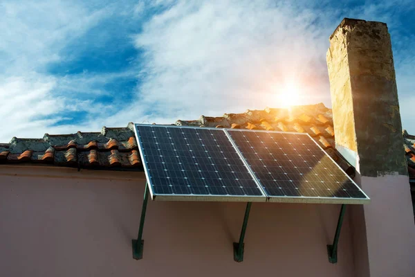 Solar panel on the roof of an old farmhouse -  concept of sustainable resources — Stock Photo, Image