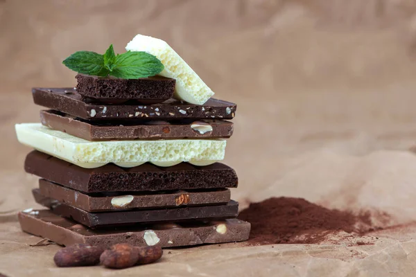 Different Kinds Chocolates Nuts Cocoa Powder Mint Selective Focus Wrapping — Stock Photo, Image