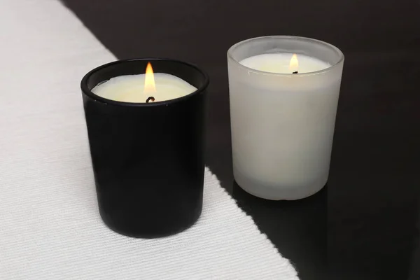 White and black candles. — Stock Photo, Image