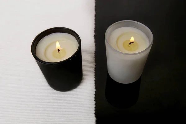 White and black candles. — Stock Photo, Image