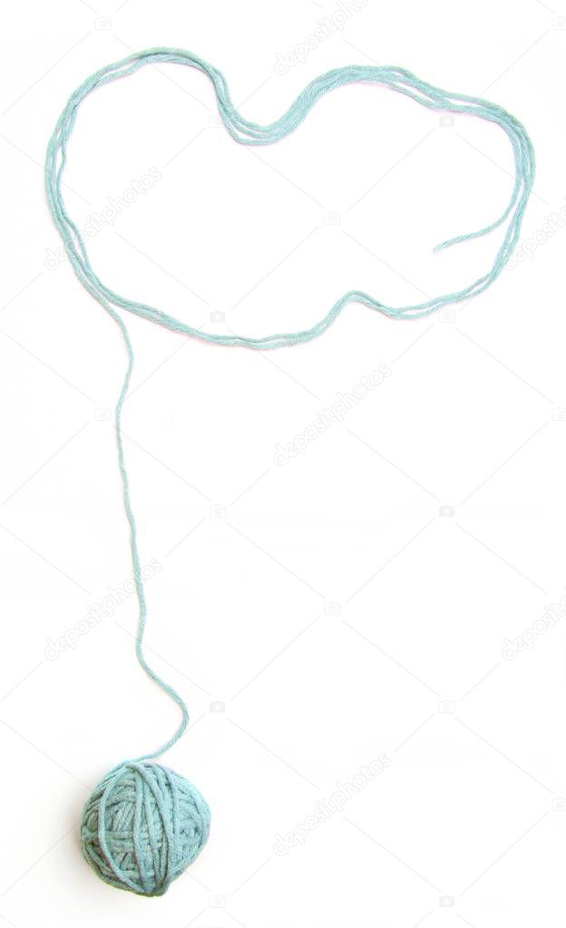 Cloud made of blue thread and thread ball  isolated on white background. Cotton thread ball with empty frame like cloud.