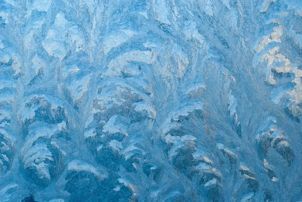 Морозный рисунок на окне — стоковое фото