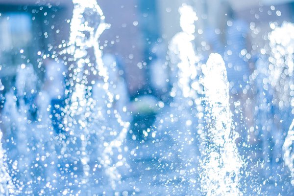 The gush of water of a fountain. Splash of water in the fountain, abstract image