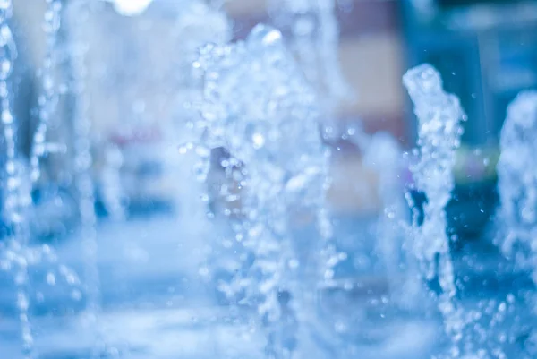The gush of water of a fountain. Splash of water in the fountain, abstract image — Stock Photo, Image