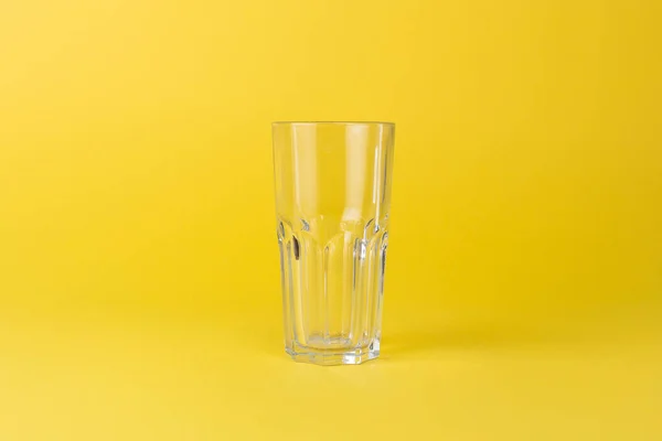 Empty Glass Cup Yellow Background — Stock Photo, Image