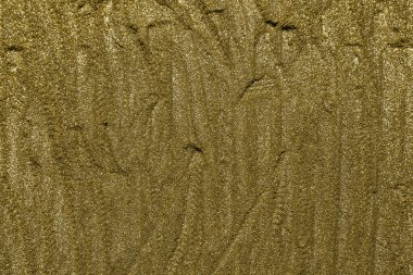 Işıltılı altın toz yüzeyinin detaylı dokusu. Altın Parlak Duvar Kağıdı, Noel, Yeni Yıl ve diğer tatiller için mükemmel. Altın ince toz.