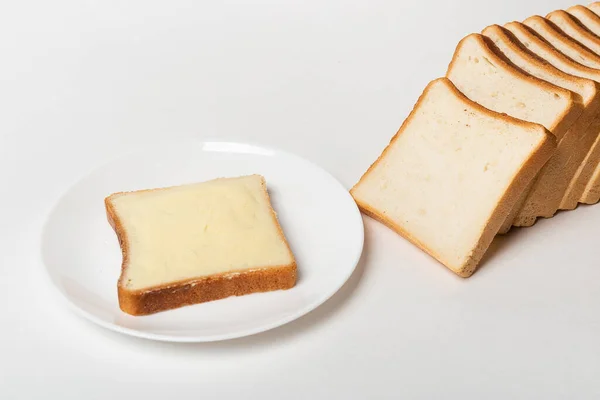 Fatia Pão Trigo Espalhada Com Manteiga — Fotografia de Stock