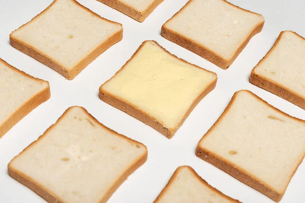 Fatias Pão Trigo Espalhadas Com Manteiga Padrão — Fotografia de Stock
