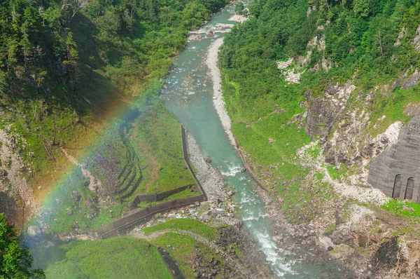 Presa de Kurobe con arco iris —  Fotos de Stock