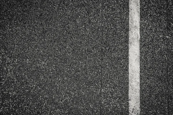Fondo de textura de asfalto con líneas de marcado — Foto de Stock