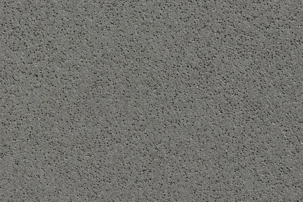 Textuur van grijze spons — Stockfoto