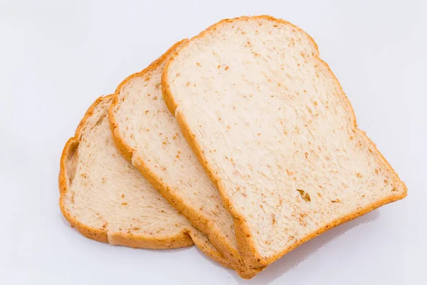 Slide whole wheat on white background — Stock Photo, Image