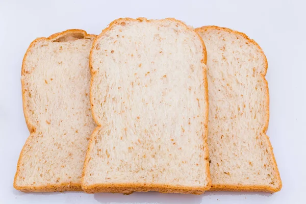 Slide whole wheat on white background — Stock Photo, Image