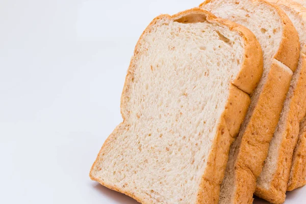 Slide whole wheat on white background — Stock Photo, Image