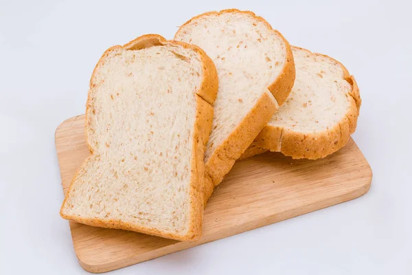 Slide whole wheat on white background — Stock Photo, Image