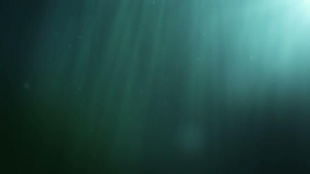 Scène sous-marine avec des rayons de fond lumineux — Video