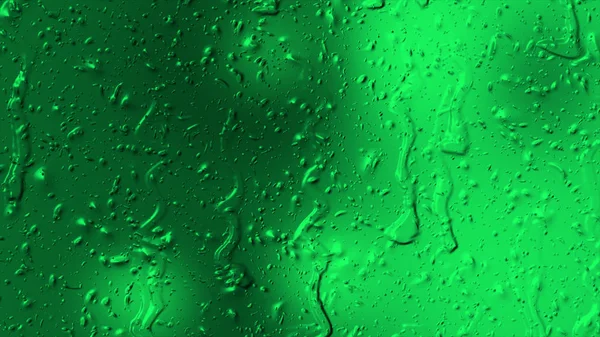 Натуральна прісна вода падає дощ на скляну текстуру — стокове фото
