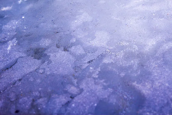 Texture of melted ice on a small river — Stock Photo, Image