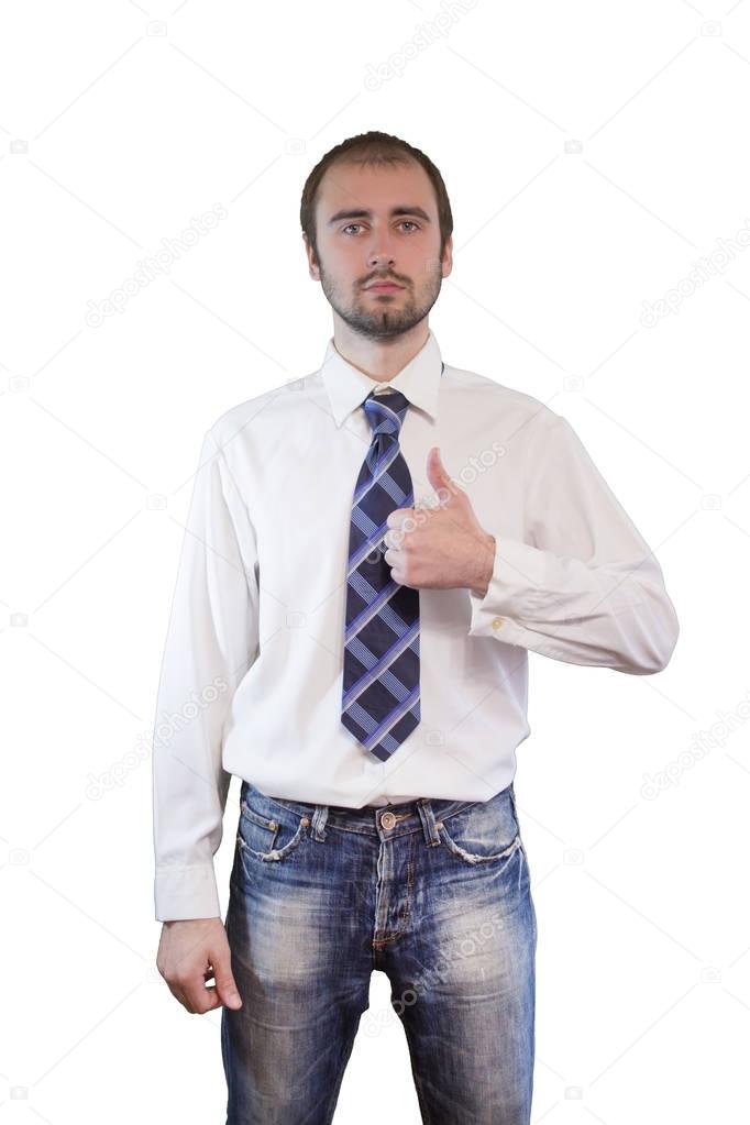 Young serious businessman shows thumbs up on isolated background