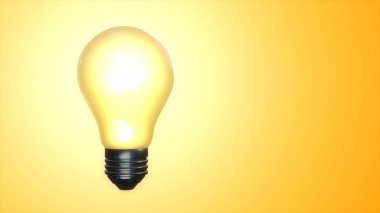 Parlayan ampul üzerinde sarı degrade arka plan kopya alanı ile izole