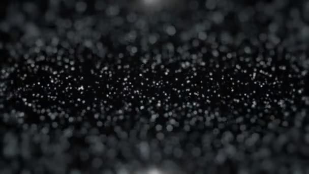Abstrakter Hintergrund mit bewegten und flackernden Teilchen. Hintergrund des Bokeh. Animation einer nahtlosen Schleife. png alpha. schwarzer Hintergrund — Stockvideo