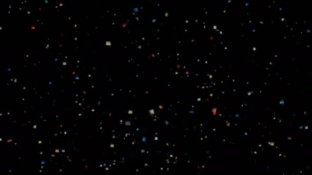 Multi-színes konfetti a fekete háttér alá tartozó — Stock videók