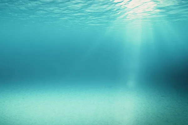 Blaue sanfte Wellen, in Zeitlupe gedrehte Ozeanoberfläche von Unterwasserstrahlen des Sonnenlichts gesehen, die durch großartige Hintergründe hindurchscheinen 3D-Illustration — Stockfoto