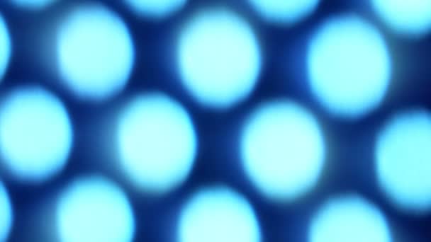 Panel giratorio brillante led en azul en desenfoque — Vídeos de Stock