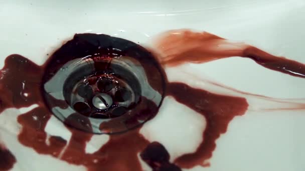 Washing the blood in the sink in slow motion — Stock Video