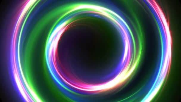 Abstrato multicolor sem costura loop neon fundo luminoso rodopiando círculos brilhantes — Vídeo de Stock
